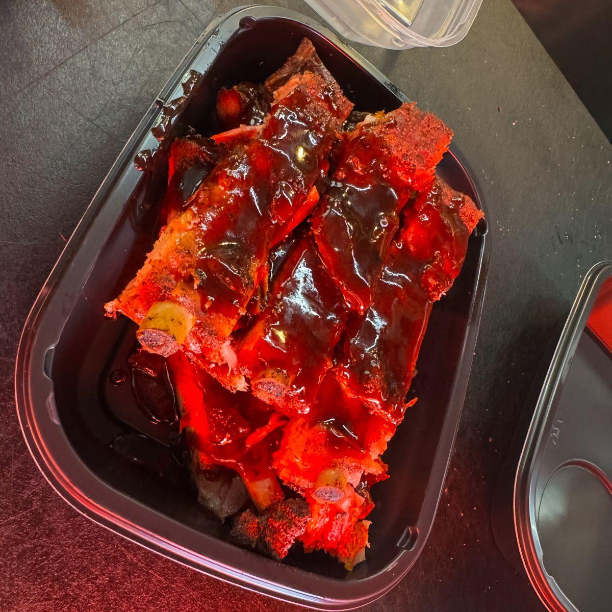 Sauced smoked pork ribs from Rolling Smokehouse BBQ trailer